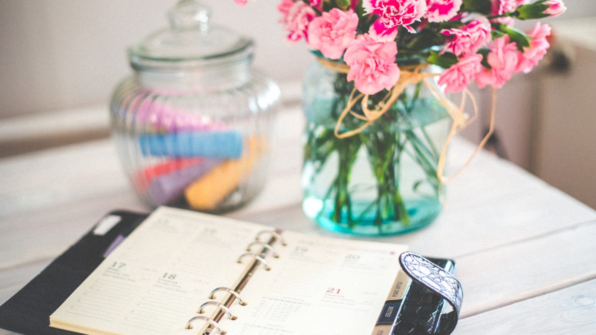 Flowers and Date Planner (Stock Image from Pexels)